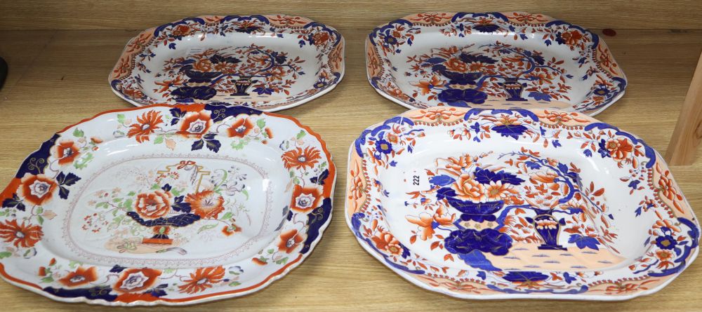 Three graduated Copeland and Garrett meat platters and an ironstone meat platter, widest 53cm